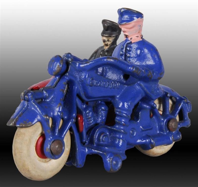 CAST IRON CHAMPION MOTORCYCLE TOY WITH PHOTOGRAPH.