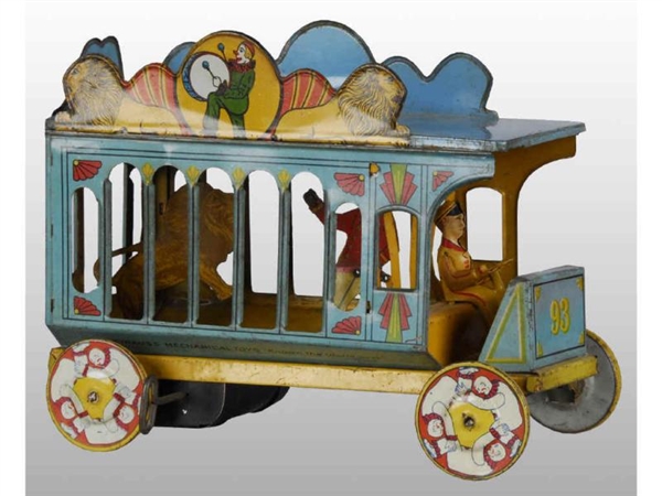 STRAUSS TIN WIND-UP CIRCUS TRUCK TOY.             