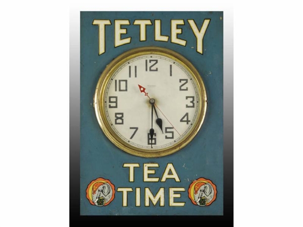 TETLEY TEA EMBOSSED TIN & WOODEN CLOCK.           