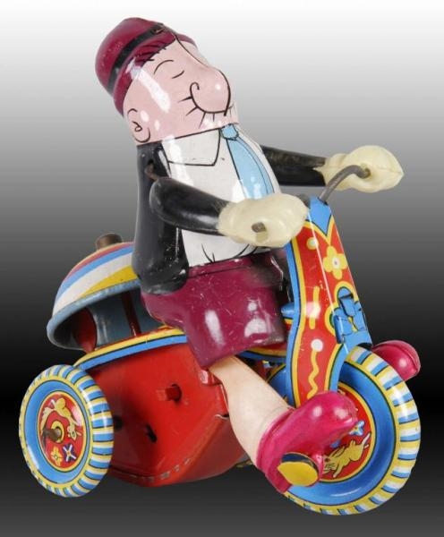 LINEMAR MECHANICAL WIMPY TRICYCLE TOY.            