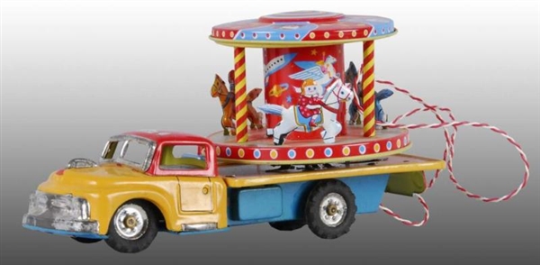 JAPANESE REMOTE CONTROL MERRY-GO-ROUND TOY TRUCK. 