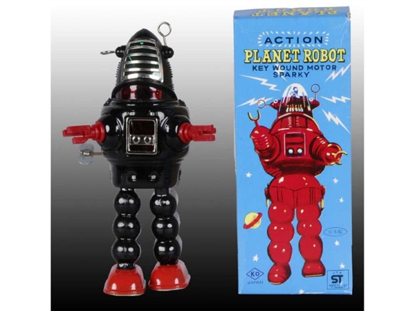 JAPANESE WIND-UP PLANET ROBOT TOY WITH BOX.       
