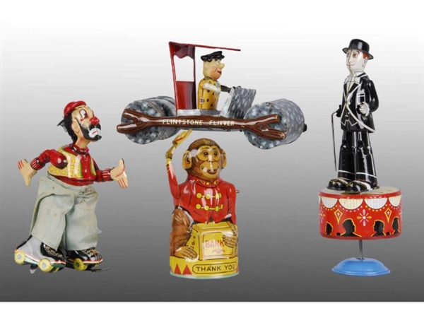 LOT OF 4: CHARACTER TIN TOYS.                     