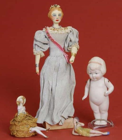 LOT: FOUR DOLL RELATED ITEMS                      