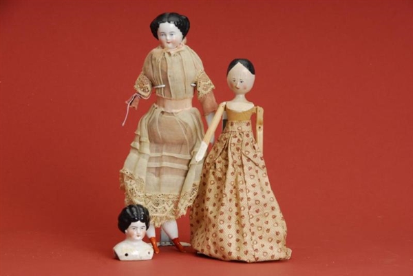 LOT: CHINA AND WOODEN DOLL                        