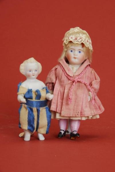 PAIR OF PAINTED EYE ALL BISQUE DOLLS              