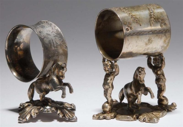 LOT OF 2: HORSE FIGURAL NAPKIN RINGS.             