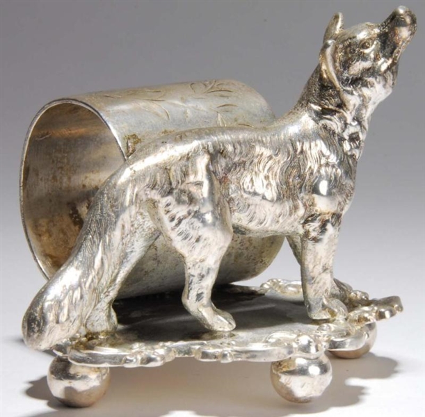 HOWLING WOLF FIGURAL NAPKIN RING.                 