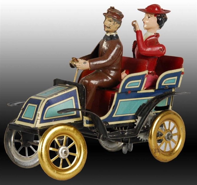 GERMAN TIN WIND-UP AUTO WITH LADY PASSENGER TOY.  