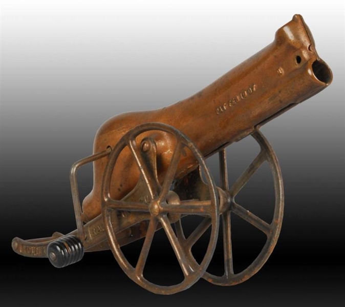 CAST IRON YOUNG AMERICAN RAPID FIRE GUN TOY.      