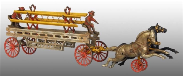 CAST IRON HORSE-DRAWN FIRE LADDER TOY.            