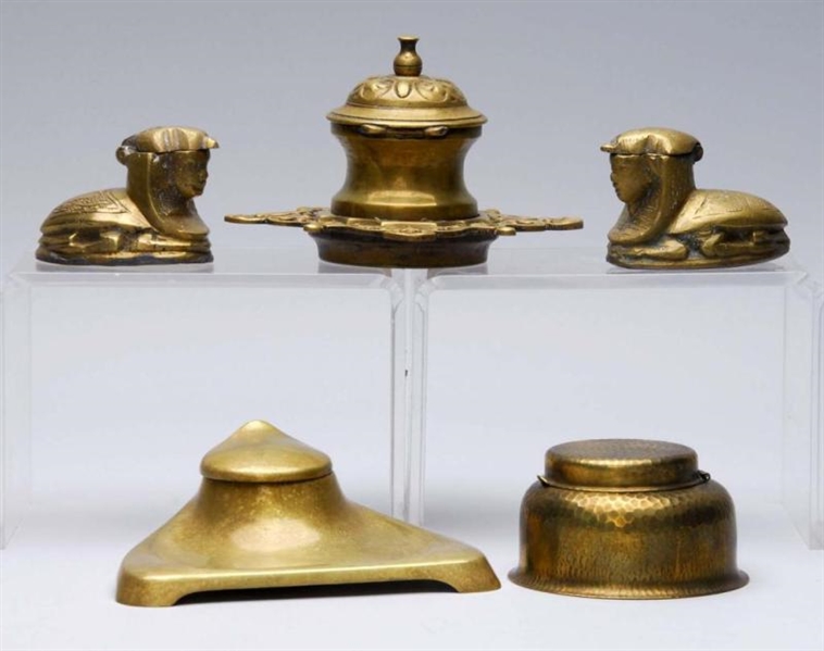 LOT OF 5: BRASS TINTED INKWELLS.                  
