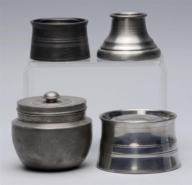 LOT OF 4: ROUND PEWTER INKWELLS.                  