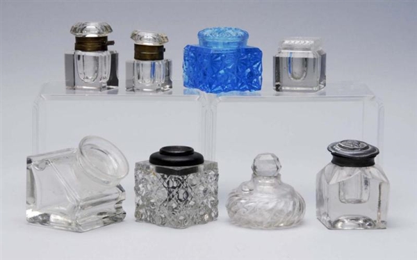 LOT OF 8: SMALL LEAD CRYSTAL INKWELLS.            
