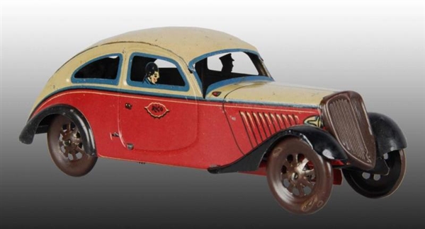 TIN WIND-UP RICO AUTOMOBILE TOY.                  