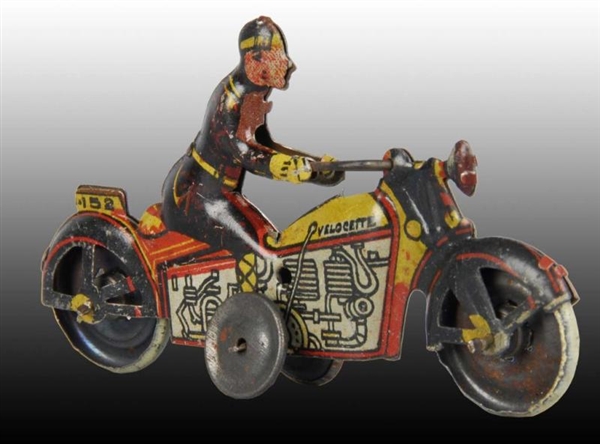 TIN SPANISH MOTORCYCLE PENNY TOY.                 