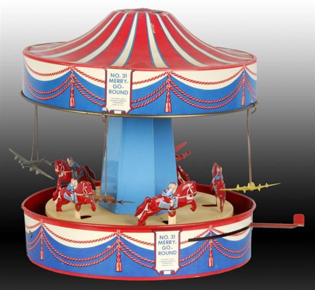 WOLVERINE LEVER-ACTION MERRY-GO-ROUND WITH BOX.   