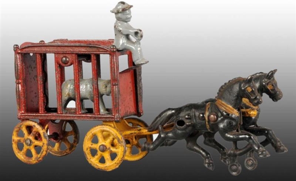 SMALL CAST IRON HUBLEY CAGE WAGON TOY.            