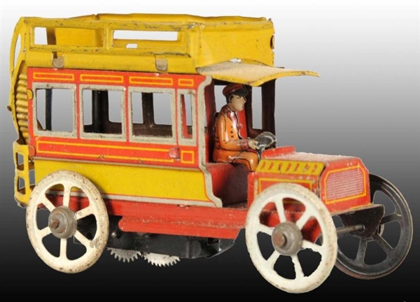 GERMAN TIN WIND-UP PENNY TOY BUS.                 