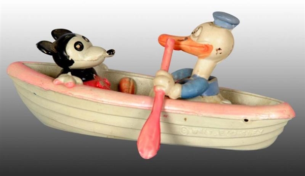 WALT DISNEY MICKEY & MINNIE MOUSE IN ROWBOAT TOY. 
