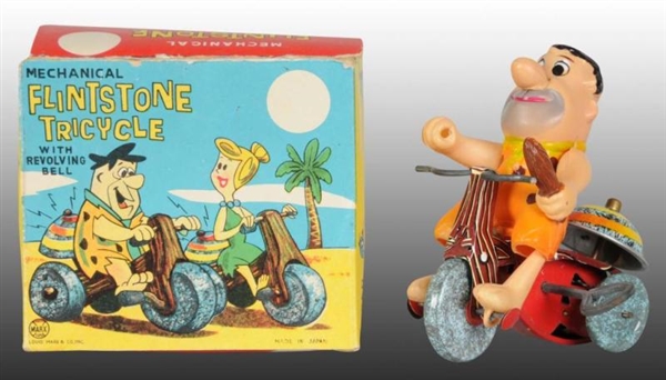MARX TIN & CELLULOID FRED FLINTSTONE TRICYCLE TOY.