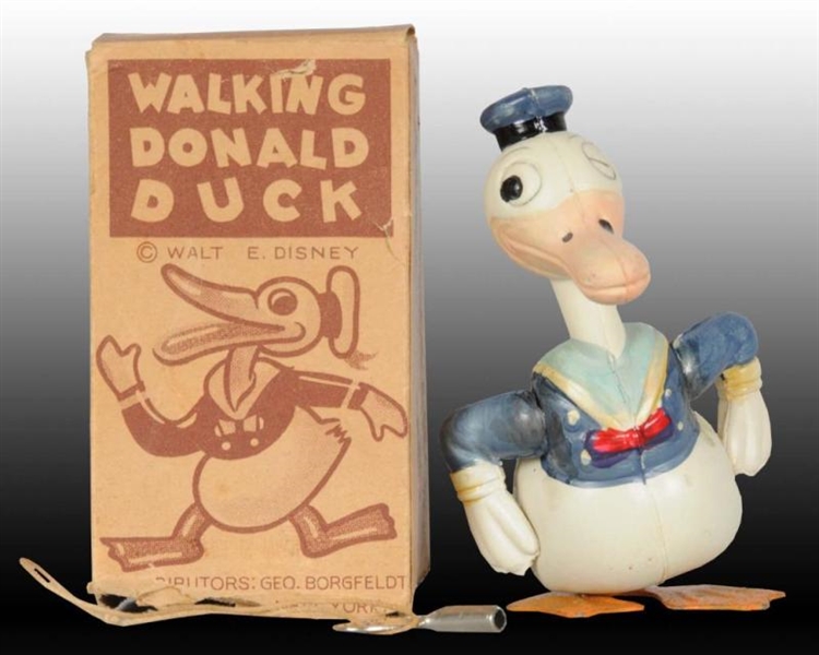 JAPANESE TIN & CELLULOID WALKING DONALD DUCK TOY. 