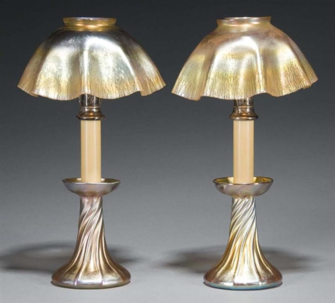 TIFFANY MATCHING PAIR OF CANDLE STICKS.           