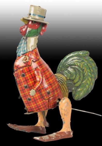 GERMAN TIN WIND-UP ROOSTER TOY.                   
