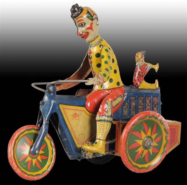 GERMAN FISHER TIN WIND-UP CLOWN MOTORCYCLE TOY.   