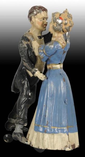 GERMAN HAND-PAINTED TANGO DANCING COUPLE TOY.     