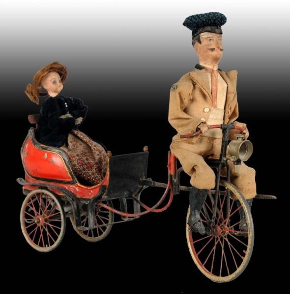 EARLY FRENCH FLYWHEEL BICYCLE TOY.                
