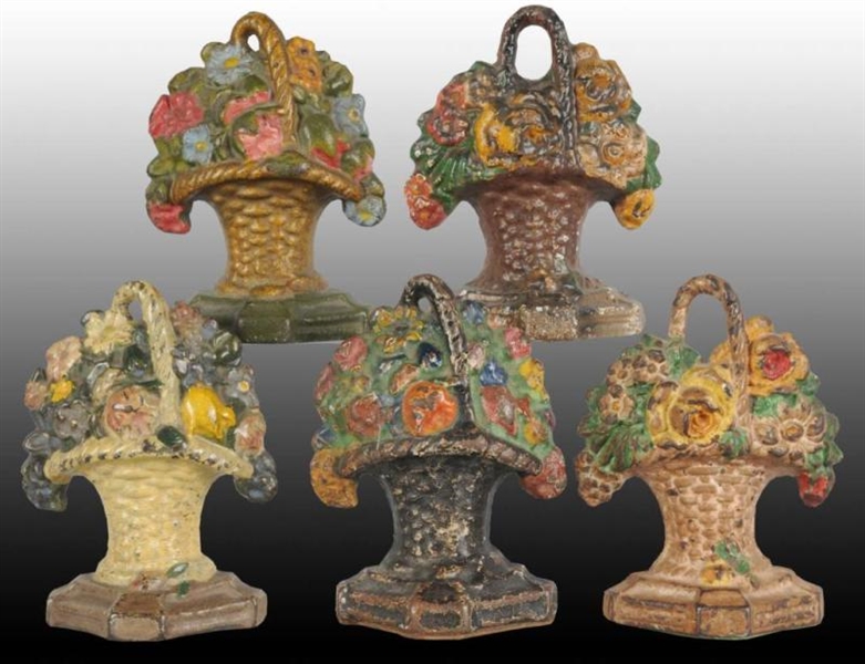 ASSORTED MIXED FLOWER CAST IRON ITEMS.            