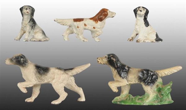 LOT OF 5: SETTER DOG CAST IRON PAPERWEIGHTS.      