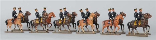 LOT OF 12: GERMAN ELASTOLIN POLICEMEN ON HORSES.  