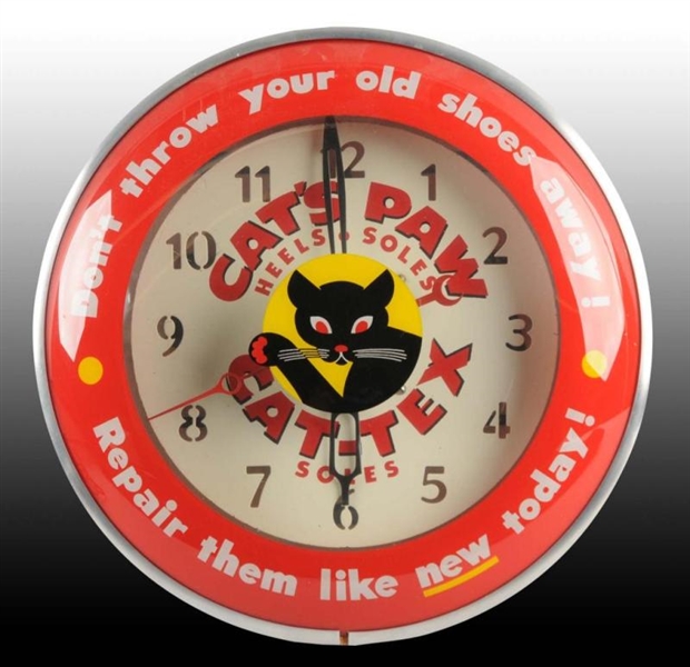 CATS PAW ELECTRIC LIGHT-UP CLOCK.                 