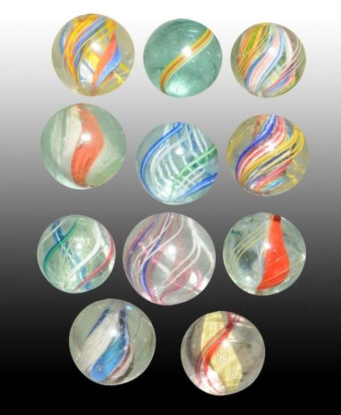 LOT OF 11: ASSORTED SWIRL MARBLES.                