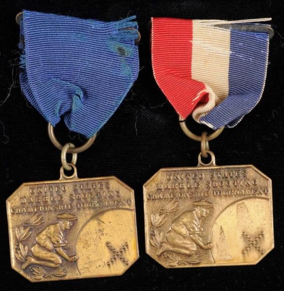 LOT OF 2: MARBLE MEDALS.                          