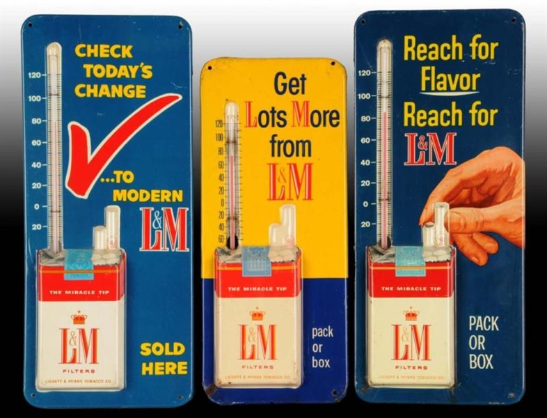 LOT OF 3: ASSORTED L&M CIGARETTE TIN THERMOMETERS.