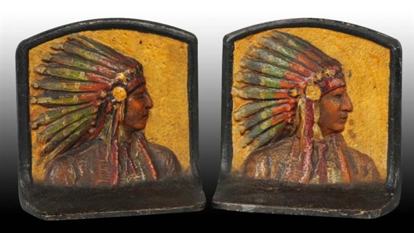 PAIR OF CAST IRON INDIAN HEAD BOOKENDS.           