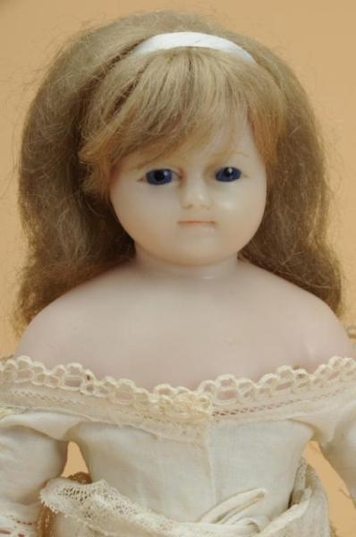 ENGLISH POURED WAX DOLL                           