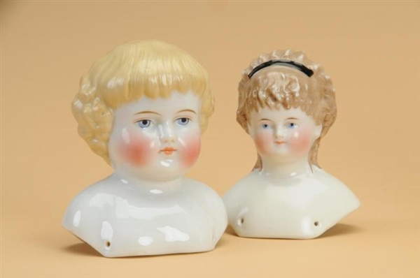 LOT: TWO BLONDE CHINA HEADS                       