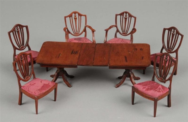 ERIC PEARSON DINING TABLE & SIX CHAIRS            