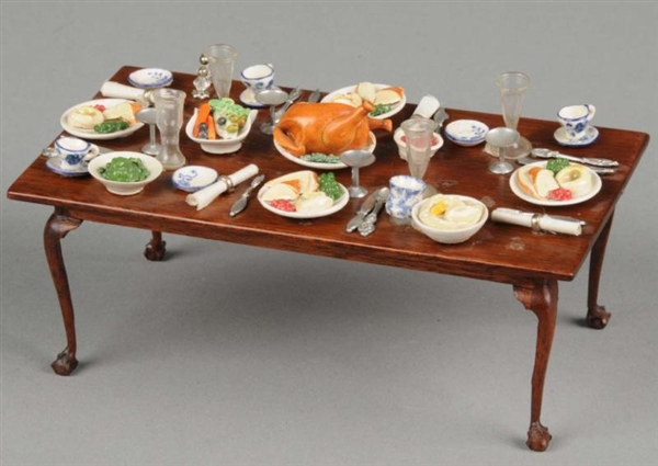 BETTY VALENTINE DINING TABLE AND MCKNIGHT DINNER  