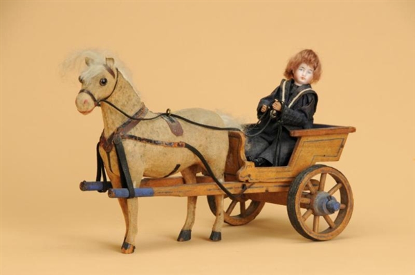 BOY IN HORSE CART                                 