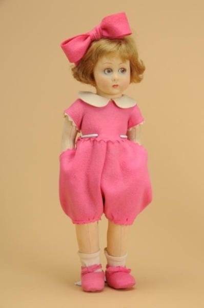 LENCI CHARACTER CHILD IN PINK ROMPER              