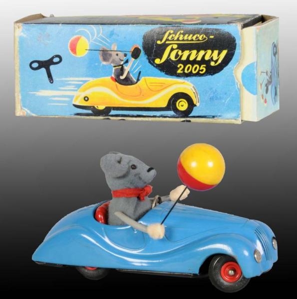 TIN SCHUCO SONNY MOUSE IN AUTOMOBILE TOY.         
