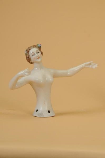 HALF DOLL LADY WITH OUTSTRETCHED ARMS             