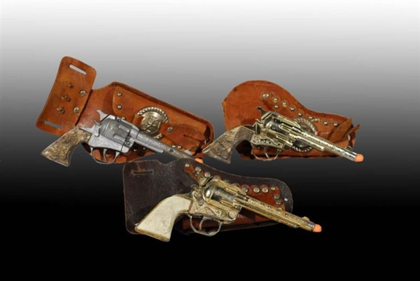 LOT OF 3: ROY ROGERS TOY CAP GUN & HOLSTER SETS.  