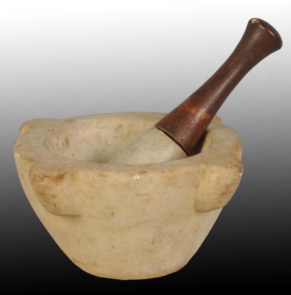 STONE AND WOODEN MORTAR & PESTLE.                 