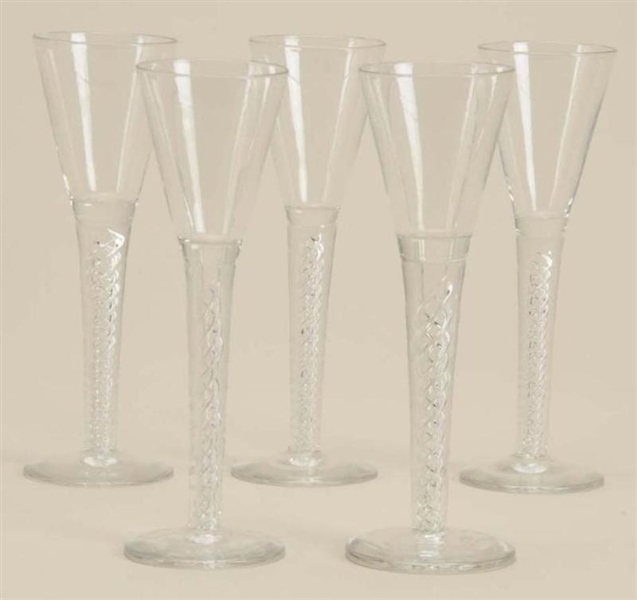 LOT OF 5: COLORLESS GLASS AIR TWIST WINE FLUTES.  